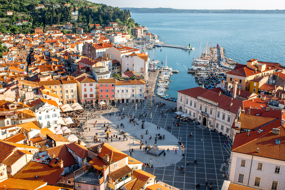 shutterstock_457528951 Beautiful aerial view on Piran town with Tartini main square, ancient buildings with red roofs and Adriatic sea in southwestern Slovenia